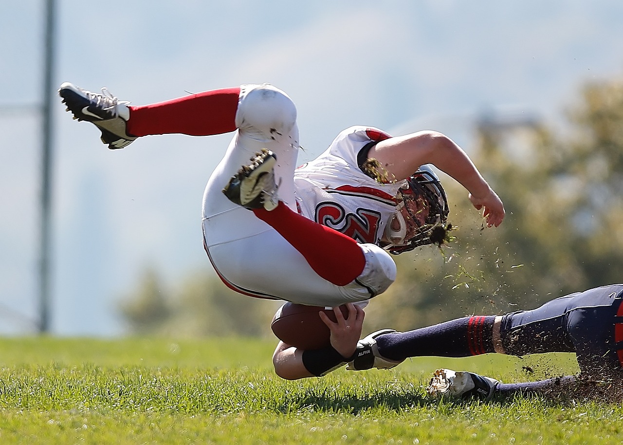 Photo of a football player falling